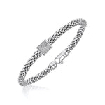 Sterling Silver Rhodium Plated Diamond Embellished Popcorn Bangle (.13cttw)