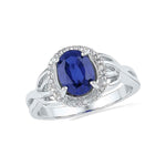 10kt White Gold Womens Oval Lab-Created Blue Sapphire Solitaire Diamond Ring .02 Cttw