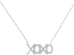 10kt White Gold Womens Round Diamond XOXO Hugs Kisses Letter Pendant Necklace 1/5 Cttw