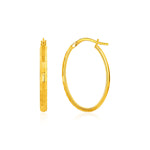 Shiny Oval Hoop Earrings in 10k Yellow Gold